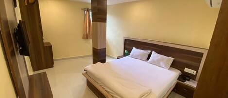 Habitación Deluxe | Camas extra, wifi gratis y ropa de cama