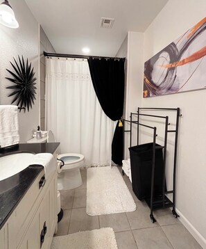 Hair dryer, towels, soap, toilet paper