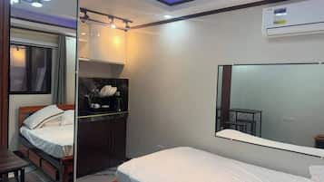 Suíte estúdio, vista para o jardim | Escrivaninha, Wi-Fi de cortesia