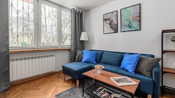 Apartemen Deluks, Bebas Asap Rokok | Area keluarga | Televisi plasma 40-inci dengan saluran TV digital