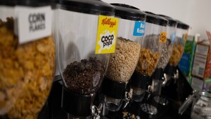 A snack dispenser with various food items labeled, including 'Coco Pops' and 'Rice Krispies'. - Standard Double Room (Salford)