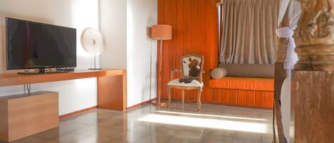 Signature Villa | Living area | 42-inch Smart TV with cable channels