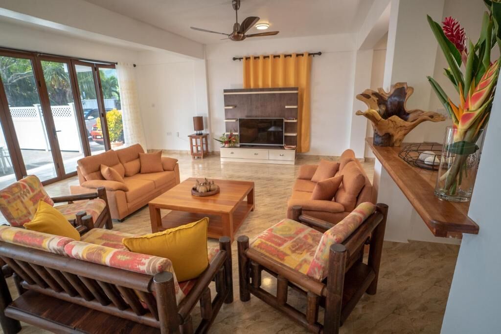 Family Villa, Ocean View | Living area | TV