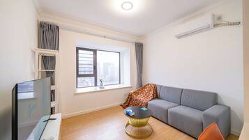 スーペリア ダブルルーム クイーンベッド 1 台 禁煙 シティビュー | リビング エリア