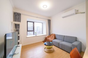 Superior tweepersoonskamer, 1 queensize bed, niet-roken, uitzicht op stad | Woonruimte