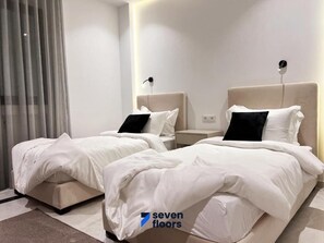 Apartament Deluxe, balcó, vistes a la ciutat | Habitacions insonoritzades, wifi gratuïta i roba de llit 