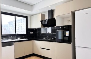 ห้องดีลักซ์ดับเบิล, ระเบียง, วิวเมือง | ครัวส่วนตัว