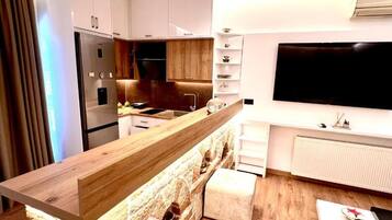 Familien-Suite, Balkon | Eigene Küche