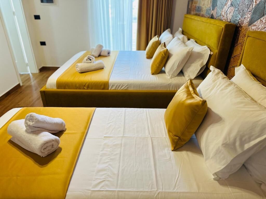 Quarto triplo superior, sacada, vista para o mar | Cofres nos quartos, quartos à prova de som, Wi-Fi de cortesia