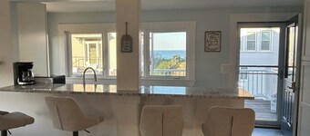 Private Rye Beach getaway with 3 bedrooms across two units, ideal for couples or families. Enjoy private beach access, ocean views, fast Wi-Fi, and walk to Petey’s Famous Seafood—steps from the sand and coastal dining.