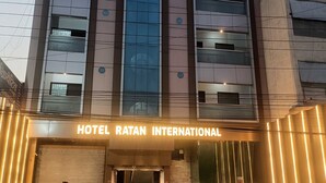 A hotel facade with the name "HOTEL RATAN INTERNATIONAL" prominently displayed. - Townhouse GE Road Raipur Formerly Ratan (Raipur)