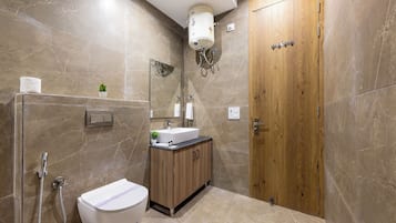 Superior Suite, Mountainside | Bathroom | Shower, towels, soap, toilet paper
