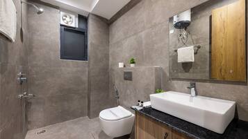 Superior Suite, Mountainside | Bathroom | Shower, towels, soap, toilet paper