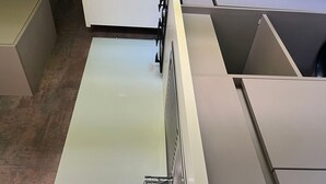 A modern office cubicle with a glass partition, metal frame, and a white desk. - Mobile Home for 4 with Terrace (Angicourt)