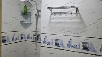 Shower, hair dryer, soap, shampoo