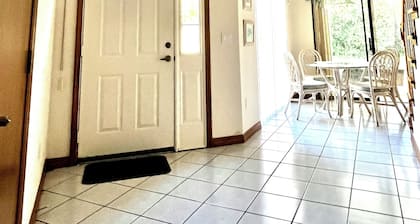 Perfect 3-bedroom house with AC in welcoming Palm Coast with access to pool.