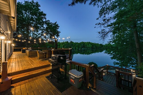 Luxury Lakefront Retreat w/ Indoor Pool, Arcade, Outdoor TV, Hot Tub + Kayaks