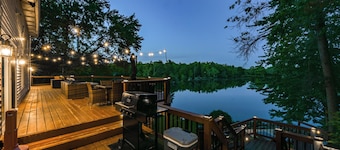 Luxury Lakefront Retreat w/ Indoor Pool, Arcade, Outdoor TV, Hot Tub + Kayaks