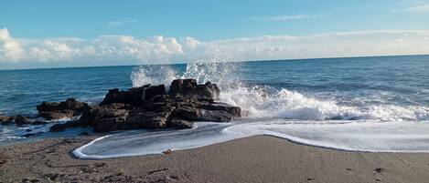 On the beach, sun loungers