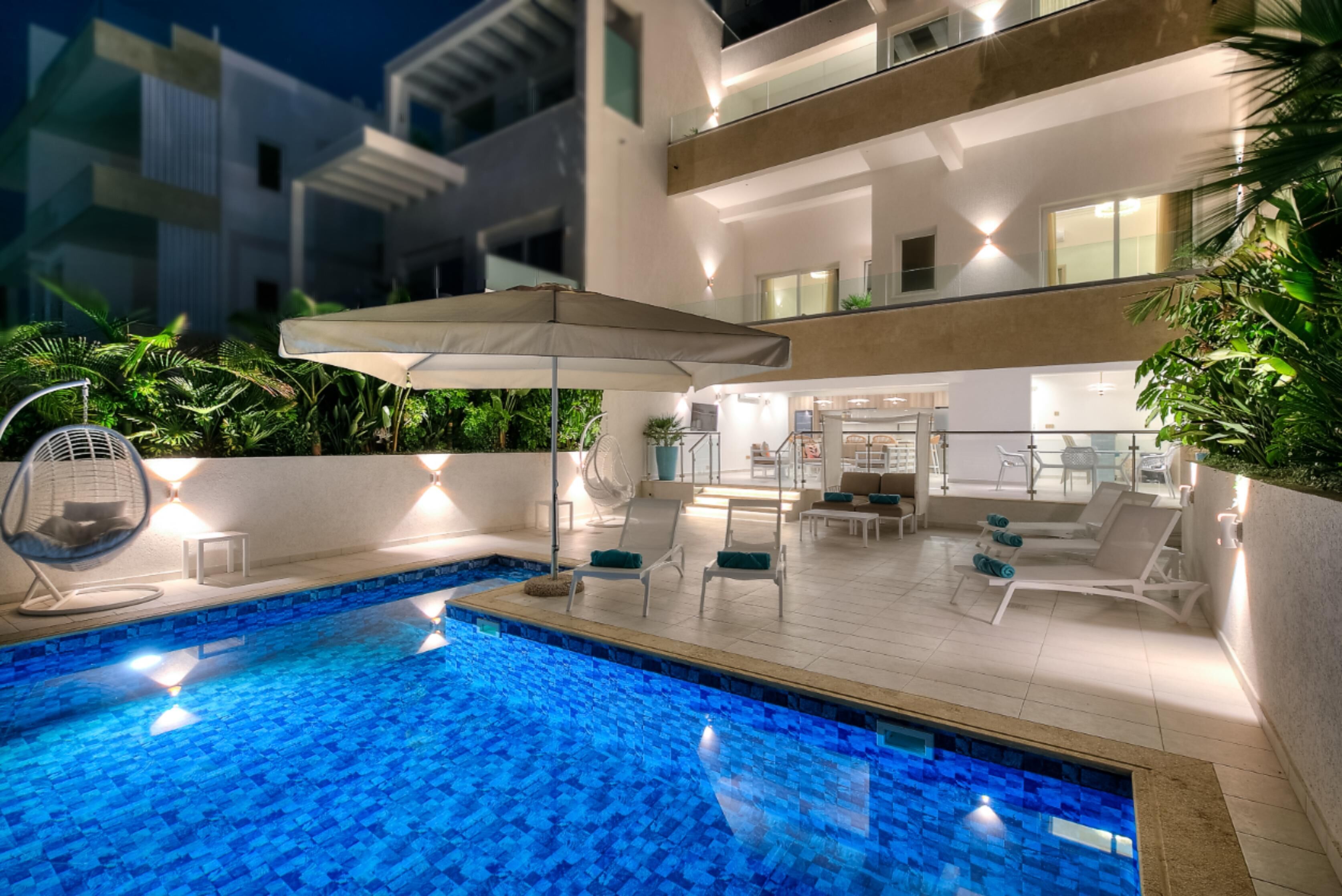 Outdoor pool, pool umbrellas, pool loungers