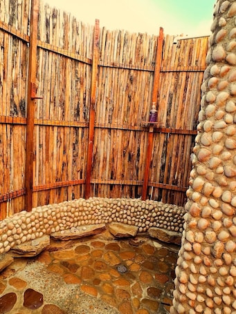 Deluxe Double Room, Beach View | Property grounds. dune ecolux