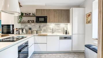 Appartement Deluxe, salle de bains privée | Cuisine privée