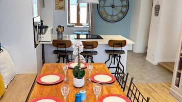 Deluxe appartement, privébadkamer | Dineren