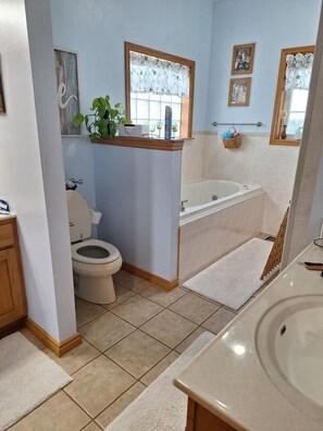 Jetted tub, hair dryer, towels, soap