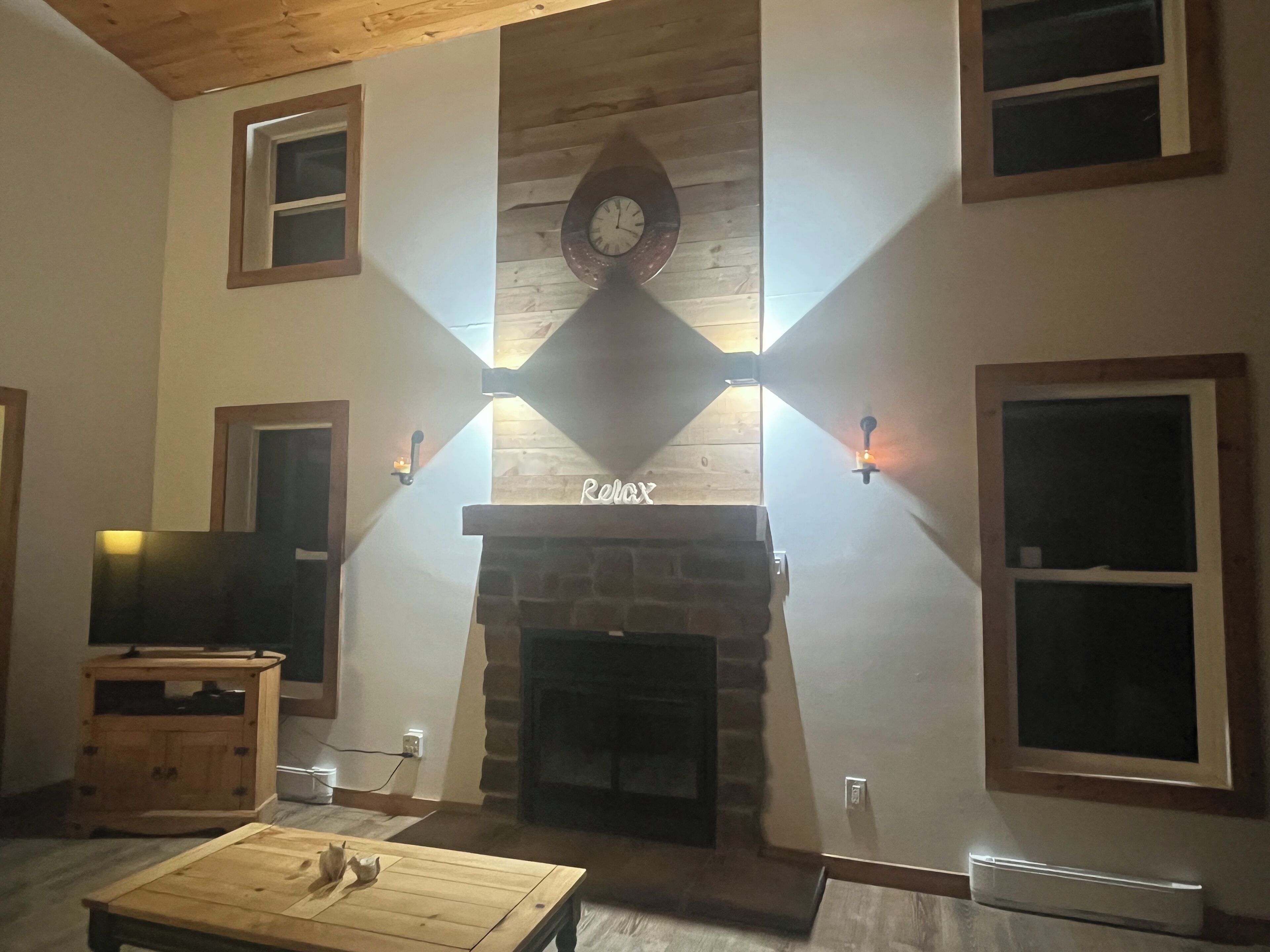 Smart TV, fireplace, DVD player, books