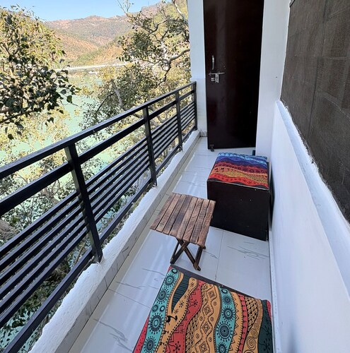 Aurovie homes |1 BHK Ganga Facing Stay with Private Ghat