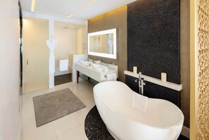 Shower, jetted bath, hair dryer, bidet - Spacious 1‑bedroom suite, complete with premium 5‑star, resort‑style amenities. (Cabo San Lucas)