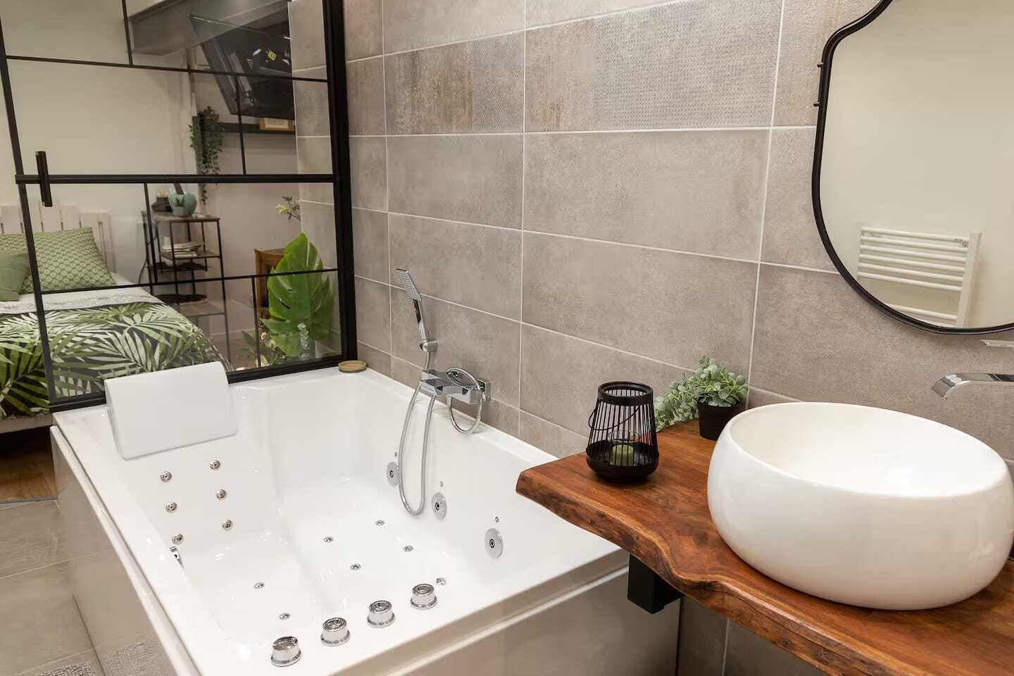 Jetted tub, hair dryer, towels, soap