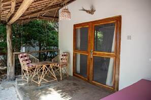 Appartement Duplex, vue océan | Restauration extérieure