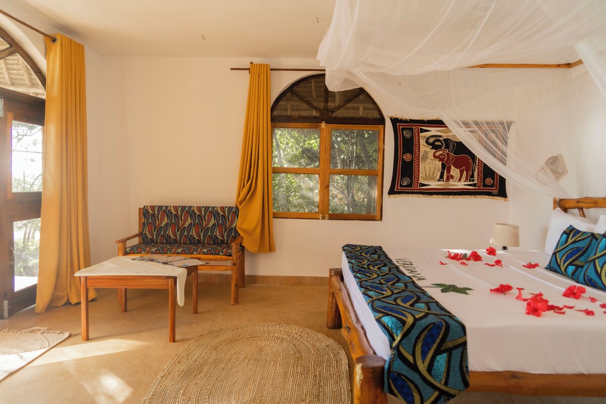 Bungalou, diversos llits, vistes a l'oceà | Roba de llit d'alta qualitat, minibar i caixa forta a l'habitació 