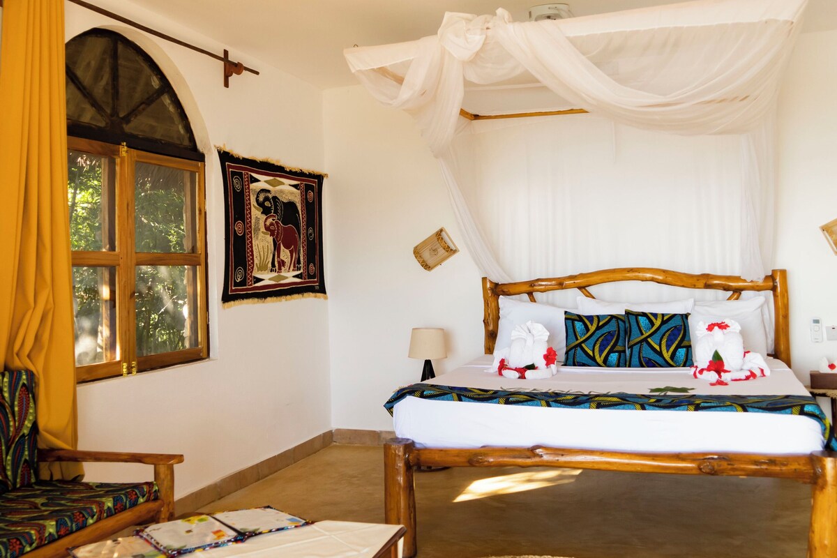 Bungalow, letti multipli, vista oceano | Biancheria da letto di alta qualità, minibar, una cassaforte in camera