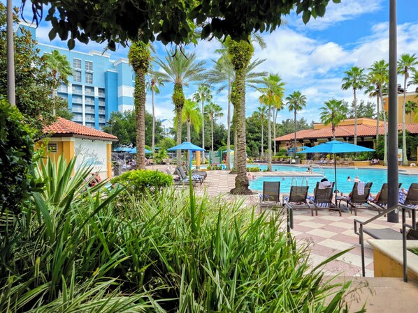 Outdoor pool, a heated pool - Spacious 2BR/2BA Pool & Lake View Condo Near Disney & All Parks (Orlando)
