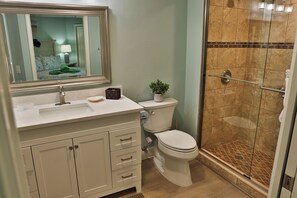 Shower, hair dryer, towels, soap