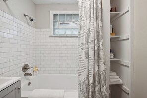 Hair dryer, towels, soap, shampoo