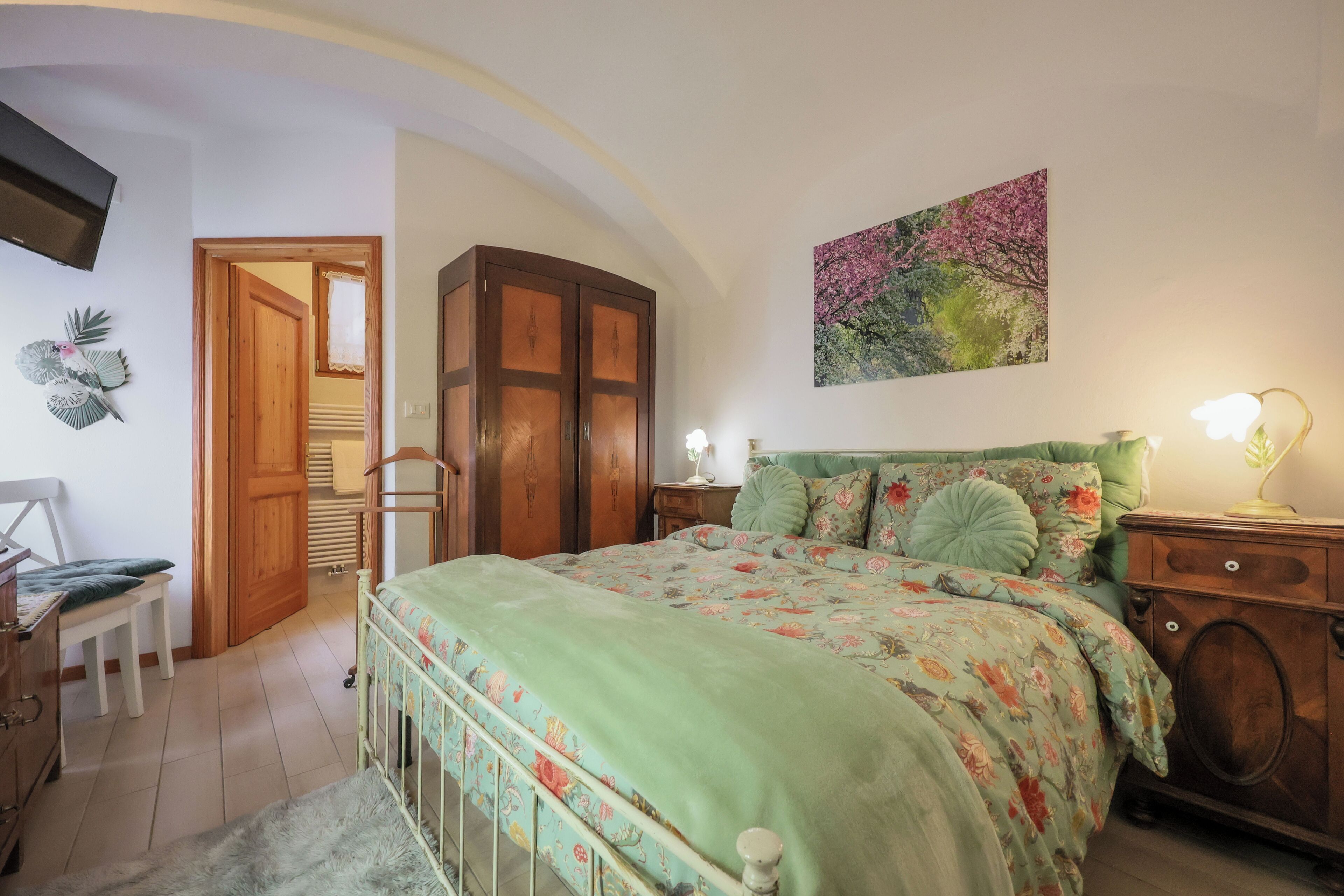 1 bedroom, desk, iron/ironing board, travel cot