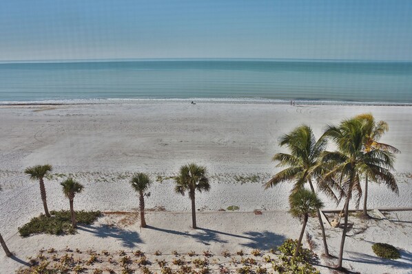 On the beach, sun-loungers, beach towels