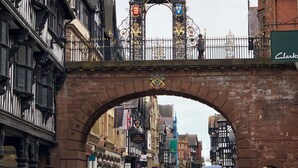 A historic town square with a prominent clock tower, a bridge, and traditional architecture. - Central Chester home. Excellent location. Sleeps 4. Pet friendly. (Chester)