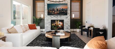 Smart TV, fireplace, books, offices