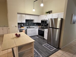 Fridge, microwave, oven, stovetop - Relaxed Desert Stay - 3BR/2BA Tucson Home - Furnished & Spacious (Tucson)