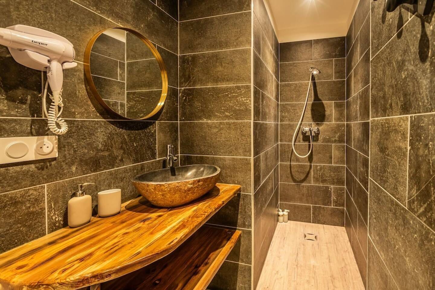 Shower, hair dryer, towels, toilet paper
