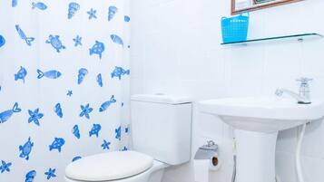 Shower, towels, soap, toilet paper