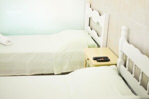 Camera tripla, vista giardino | Spa