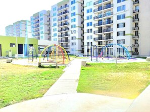 Children’s area - Modern Apartment In Quiet Area With Swimming Pools (Santa Marta)