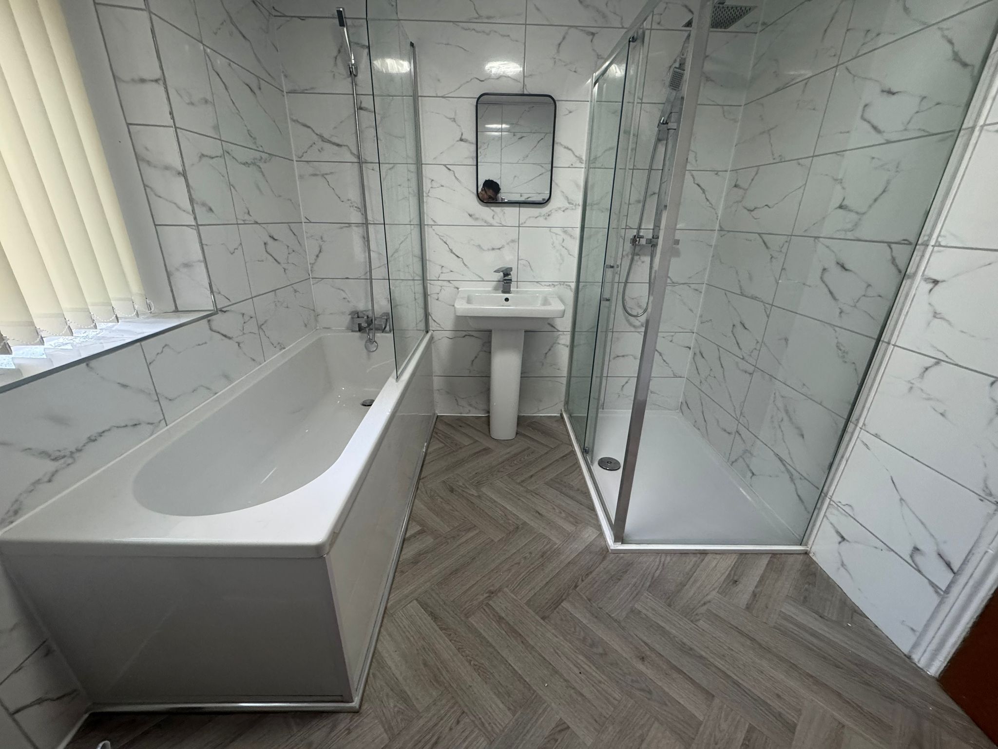 Shower, towels, toilet paper