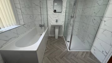 Shower, towels, toilet paper