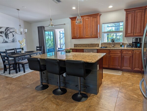 Fridge, microwave, oven, stovetop - Charming 3-bedroom house with AC in Englewood, heated pool, 5 miles to beach (Englewood)